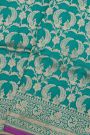 Banarasi Silk Teal Blue Saree With Florals And Pecocks Body