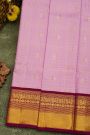 Kancheepuram Silk Lavender Saree With Checks And Floral Buttis Body And Contrast Peacocks Border