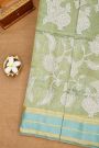 Fancy Kora Sage Green Saree With Florals And Peacocks In Thread Work Body And Contrast Zig-Zag Lines Border And Zari Lines Pallu