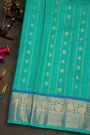 Gadwal Silk Sea Blue Saree With Florals And Peacocks In Zari Checks Body