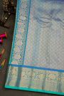 Gadwal Silk Sea Blue Saree With Florals And Peacocks In Zari Checks Body
