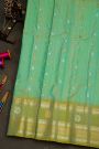 Gadwal Silk Sea Green Saree With Florals And Paisleys In Zari Checks Body