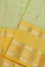 Gadwal Silk Light Green Saree With Gold Buttas And Mustard Gold Zari Border