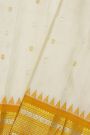 Gadwal Silk Cream Saree With Floral Buttis In Zari Body