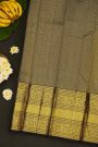 Kancheepuram Silk Black Saree With Floral Buttis Body
