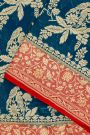 Banarasi Kaddi Georgette Teal Blue Saree With Florals And Parrots Body