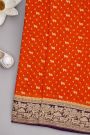 Banarasi Georgette Rust Orange Saree With Florals And Small Cow Buttis Body
