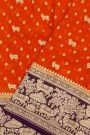 Banarasi Georgette Rust Orange Saree With Florals And Small Cow Buttis Body