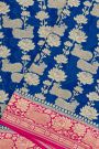 Banarasi Georgette Royal Blue Saree With Florals And Leaves With Cows Body