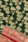 Banarasi Georgette Bottle Green Saree With Florals And Leaves With Cows Body