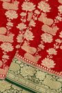 Banarasi Georgette Red Saree With Florals And Leaves With Cows Border