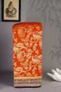 Banarasi Georgette Orange Saree With Florals And Leaves Border