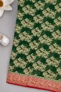 Banarasi Georgette Bottle Green Saree With Florals And Swans Border