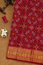 Ikat Silk Maroon Saree With Florals And Leaves Body