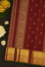 Kancheepuram Silk Maroon Saree With Cross Lines In Zari With Peacocks Border