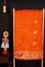 Bandhani Silk Orange Saree With Florals And Deers In Bandhani Body