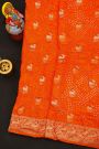 Bandhani Silk Orange Saree With Florals And Deers In Bandhani Body