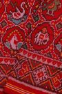 Patola Silk Orange Saree With Florals, Animals, Birds And Humans Motifs Body