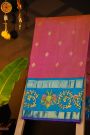 Gadwal Silk Magenta Saree With Tanjore Hand Painted Florals And Gandaberunda Border