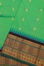 Narayanpet Silk Parrot Green Saree With Checks Buttis And Floral Border