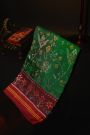 Patola Silk Green Saree With All Over Jaals And Leaf Lines Border