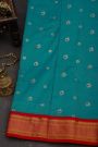 Narayanpet Silk Teal Blue Saree With Florals And Peacock Buttis Body