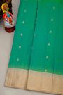Coimbatore Silk Teal Green Saree With Florals And Peacock Buttis Body