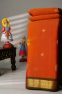 Coimbatore Silk Orange Saree With Florals And Buttis Body