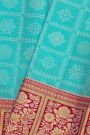 Kancheepuram Silk Sky Blue Saree With Florals And Leaves In Checks Body