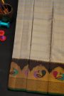 Kancheepuram Silk Grey Saree With Multi Colour Peacocks Border