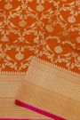 Banarasi Silk Orange Saree With Florals And Leaves Jaal Border
