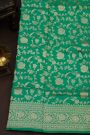Banarasi Silk Sea Green Saree With Floral And Leaf Jaal Body