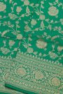 Banarasi Silk Sea Green Saree With Floral And Leaf Jaal Body