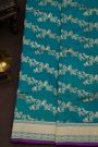 Banarasi Silk Peacock Blue Saree With Cross Lines In Zari Border