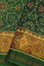 Patola Silk Bottle Green Saree With Florals And Leaves Jaal Border