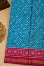Patola Silk Sea Blue Saree With Florals And Leaves Jaal Border