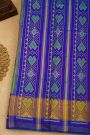 Patola Silk Sea Green Saree With Florals And Leaves Jaal Border