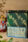 Venkatagiri Silk Bottle Green Saree With Floral Jaal And Peacocks Body