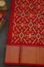 Ikat Silk Red Saree With Florals And Leaves Body