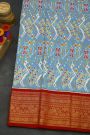 Pochampally Ikat Silk Sky Blue Saree With Floral And Peacock Border