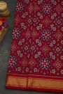 Ikat Silk Maroon Saree With Florals And Leaves Body