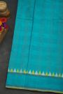 Ikat Silk Turquoise Blue Saree With Checks Body