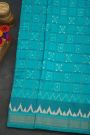 Pochampally Ikat Silk Sky Blue Saree With Floral And Butti In Checks Body
