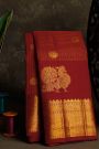 Kancheepuram Silk Red Saree With Zari Checks Floral And Peacock Buttis Body