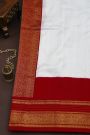 Pochampally Ikat Silk Bottle Green Saree With Florals And Parrots Border