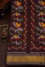 Ikat Silk Dark Maroon Saree With Floral And Leaves Body