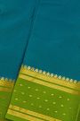 Mysore Crepe Teal Blue Saree With Florals And Buttis Border