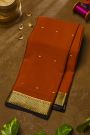 Mysore Crepe Rust Orange Saree With Florals And Buttis In Zari Border