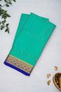 Mysore Crepe Sea Green Saree With Floral Leaves And Paisley Border