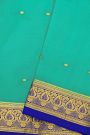 Mysore Crepe Sea Green Saree With Floral Leaves And Paisley Border
